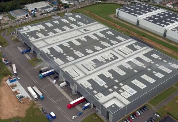 Automotor distribution center trucks aerial view