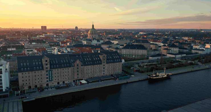 aerial photo of the outside of copenhagen at sunset