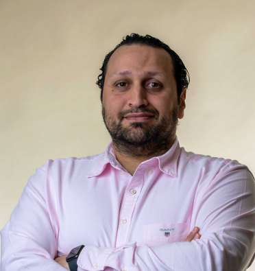 headshot of almalki supply chain and logistics director khaled eldamouri