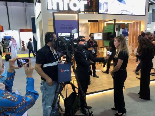 Amel Gardner, Infor VP and general manager of Middle East & Africa, conducts an interview at the Infor booth at Gitex.