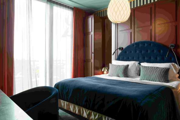 Elite hotel guest room bed