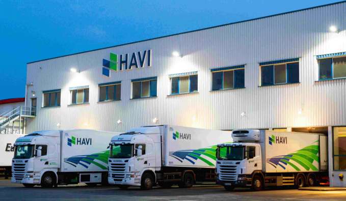 HAVI distribution center building with 3 trucks