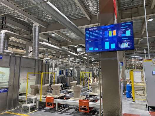 inside of a manufacturing facility where toilets are being made