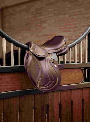 photo of a leather saddle hanging over a horse stall