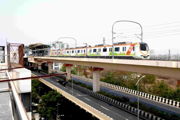 India commuter train on elevated track