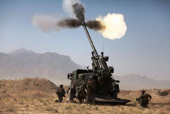photo of a military vehicle firing a projectile