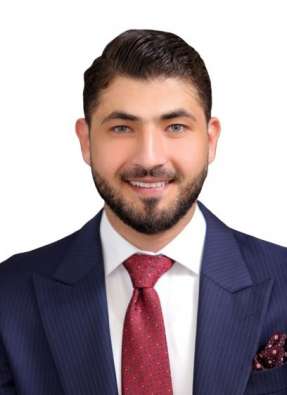 Headshot of Oday Abu Shehab, Mooneh's executive director