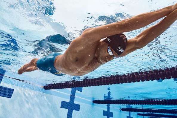 underwater photo of a male swimmer swimming the breastroke