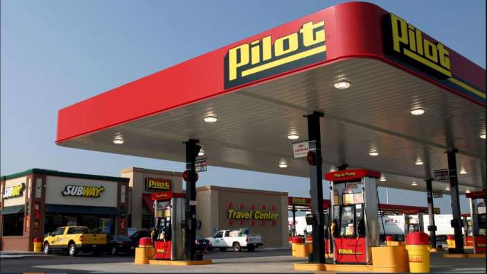 pilot flying j red and white gas station with an attached subway