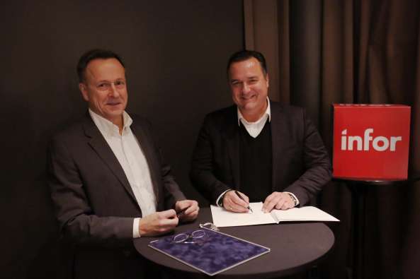 photo of infor ceo and infor evp pasing at an event