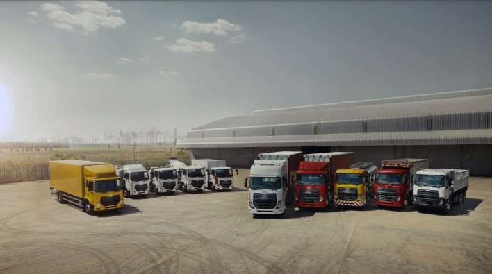 photo of a lineup of trucks ready to go out for work