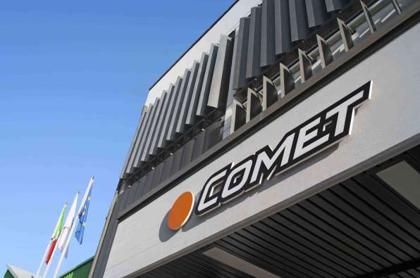 comet logo on the side of the building