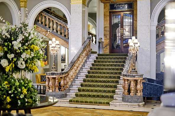 photo of an ornate staircase in a hotel