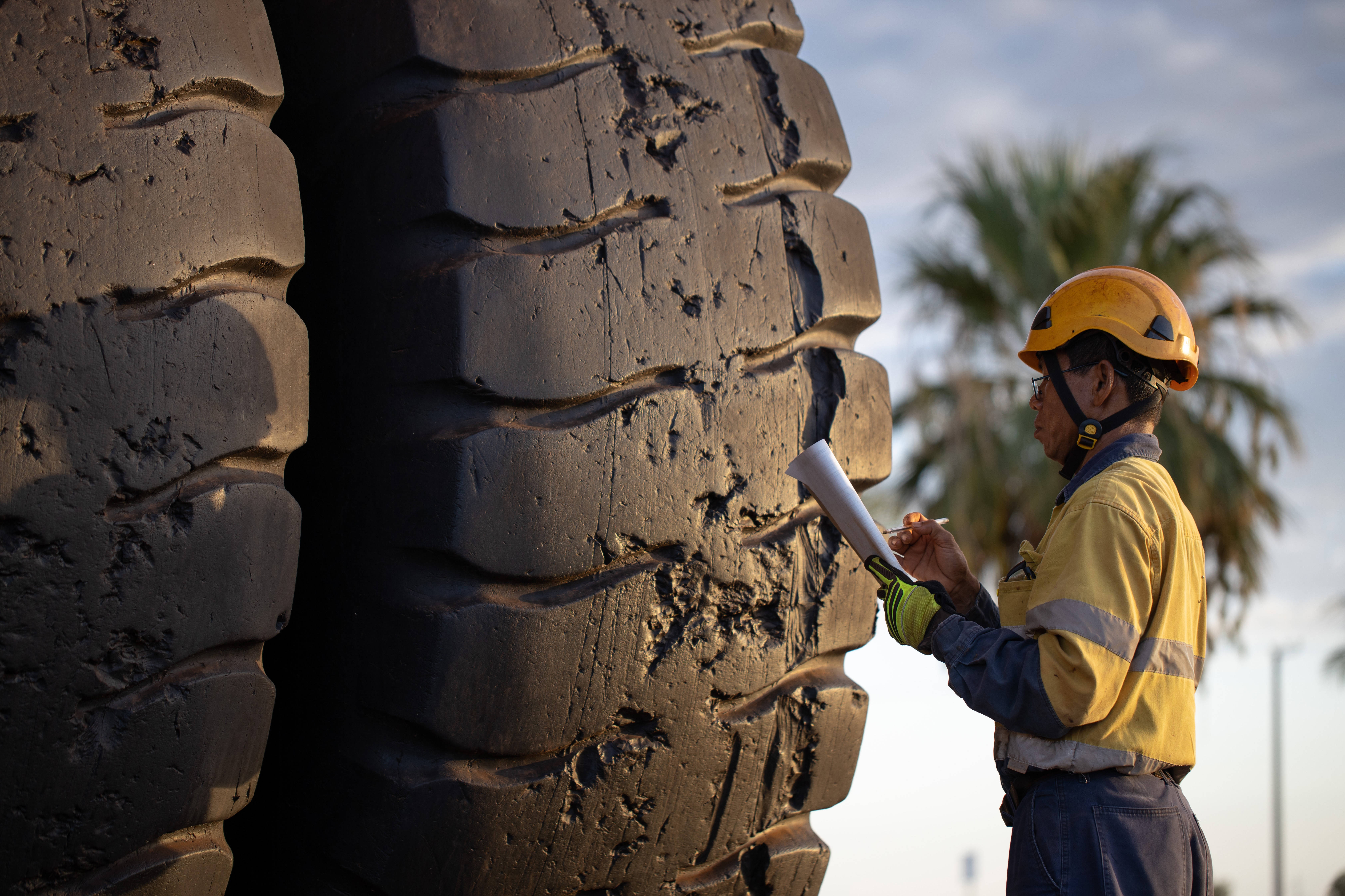 Technician Inspecting Truck
